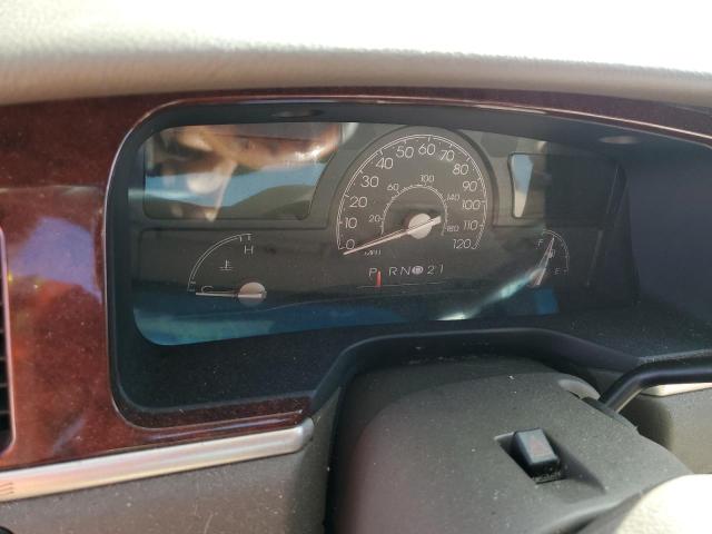 Photo 9 from auction – 2004 LINCOLN TOWN CAR U with VIN 1LNHM83W64Y660553