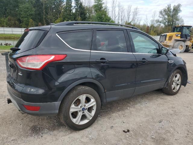 Photo 3 from auction – 2014 FORD ESCAPE SE with VIN 1FMCU9G92EUD99306
