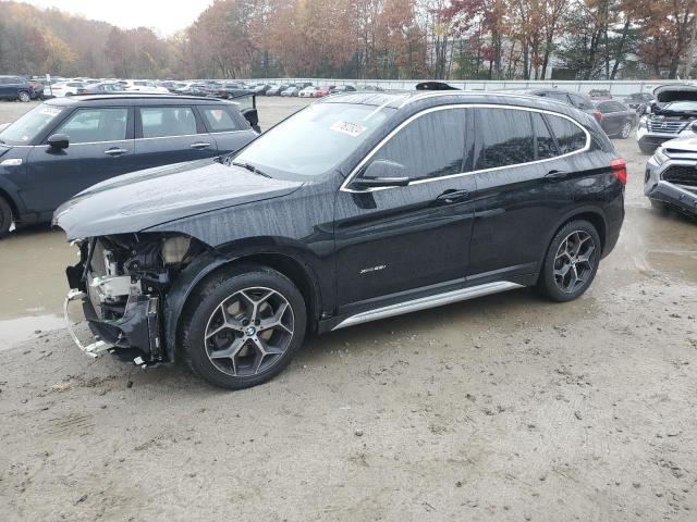 BMW X1 XDRIVE2 2017 with VIN WBXHT3Z35H4A55935 - Photo from auction