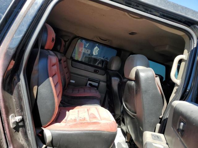 Photo 10 from auction – 2003 HUMMER H2 with VIN 5GRGN23U73H113541