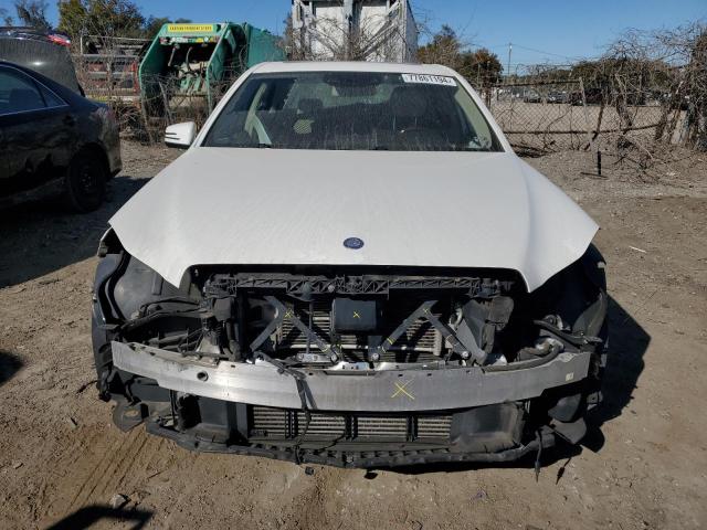 Photo 5 from auction – 2014 MERCEDES-BENZ E 250 BLUE with VIN WDDHF9HB8EA871652