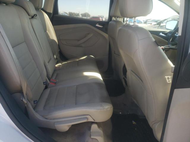 Photo 11 from auction – 2016 FORD ESCAPE TIT with VIN 1FMCU0J98GUB73360