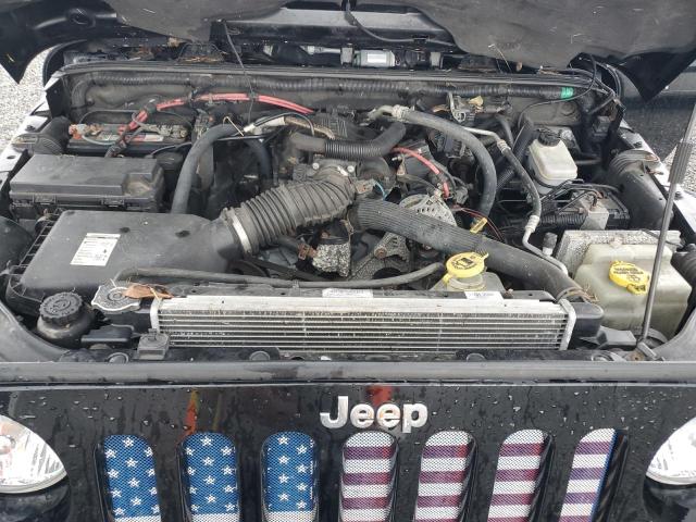 Photo 11 from auction – 2011 JEEP WRANGLER U with VIN 1J4BA5H14BL608843