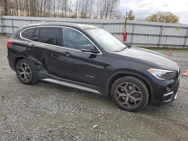 Photo 4 from auction – 2017 BMW X1 XDRIVE2 with VIN WBXHT3C37H5F87917