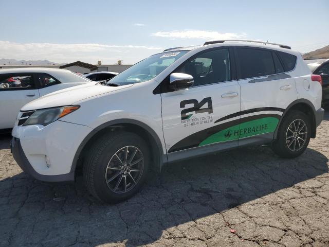 TOYOTA RAV4 XLE 2014 with VIN 2T3WFREV5EW098544 - Photo from auction