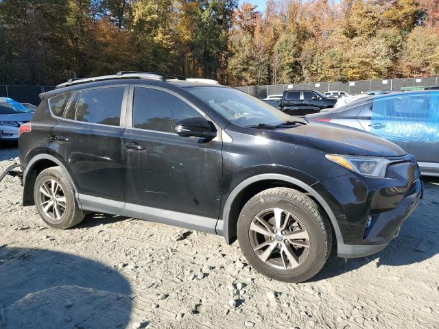 Photo 4 from auction – 2017 TOYOTA RAV4 XLE with VIN 2T3RFREV7HW594205