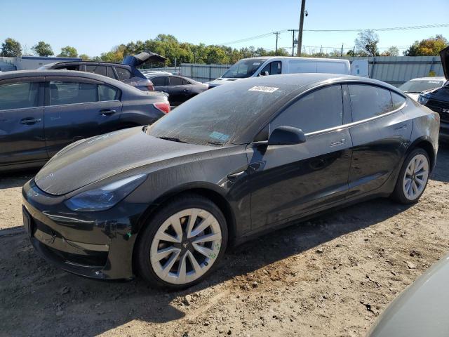 TESLA MODEL 3 2022 with VIN 5YJ3E1EB7NF191665 - Photo from auction