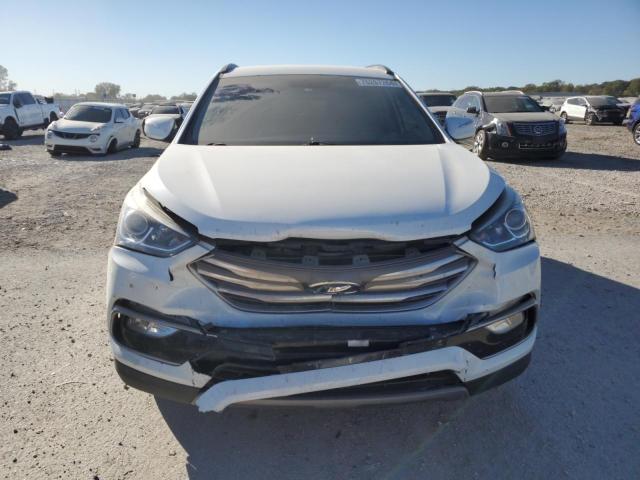 Photo 5 from auction – 2017 HYUNDAI SANTA FE S with VIN 5NMZU3LB0HH007486