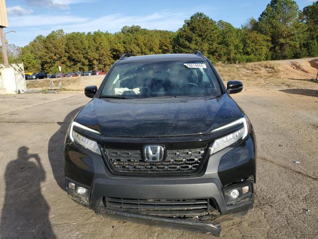 Photo 5 from auction – 2021 HONDA PASSPORT T with VIN 5FNYF8H93MB040910