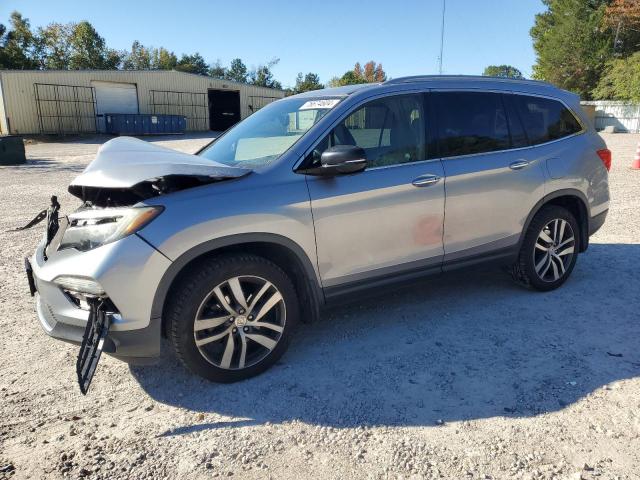 HONDA PILOT ELIT 2017 with VIN 5FNYF6H03HB073806 - Photo from auction