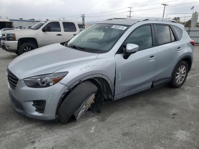 MAZDA CX-5 TOURI 2016 with VIN JM3KE2CY3G0679268 - Photo from auction