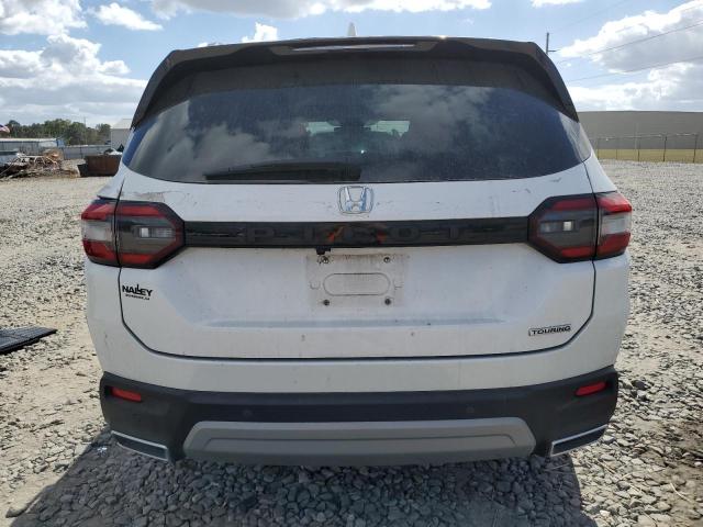 Photo 6 from auction – 2023 HONDA PILOT TOUR with VIN 5FNYG2H76PB013732