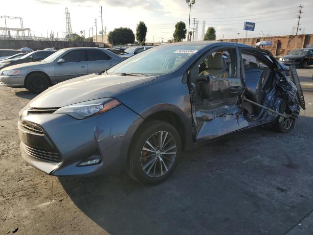 TOYOTA COROLLA L 2017 with VIN 5YFBURHE4HP641316 - Photo from auction