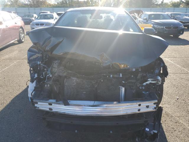 Photo 5 from auction – 2022 TOYOTA COROLLA LE with VIN 5YFEPMAE1NP358174