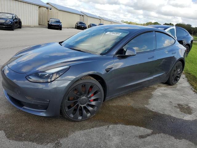 TESLA MODEL 3 2022 with VIN 5YJ3E1EC7NF318908 - Photo from auction