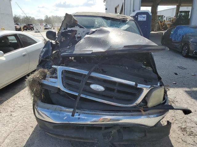 Photo 5 from auction – 2003 FORD F150 SUPER with VIN 1FTRW07653KC79888