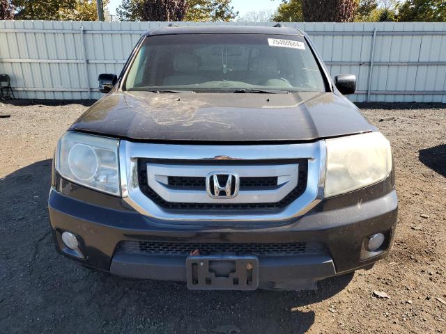 Photo 5 from auction – 2011 HONDA PILOT EXL with VIN 5FNYF4H66BB038371
