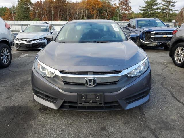 Photo 5 from auction – 2018 HONDA CIVIC LX with VIN 19XFC2F53JE209807