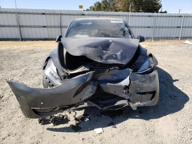 Photo 5 from auction – 2022 TESLA MODEL Y with VIN 7SAYGDEE0NF572496