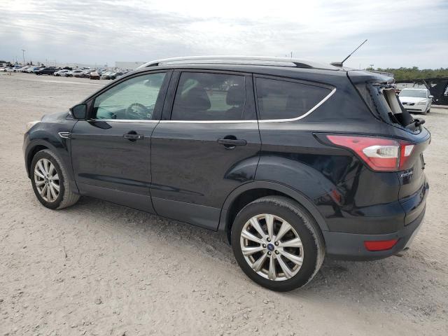 Photo 2 from auction – 2017 FORD ESCAPE TIT with VIN 1FMCU0JD0HUB05933