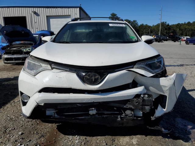 Photo 5 from auction – 2016 TOYOTA RAV4 XLE with VIN JTMWFREV4GD090791