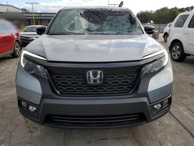 Photo 5 from auction – 2021 HONDA PASSPORT E with VIN 5FNYF7H57MB001079