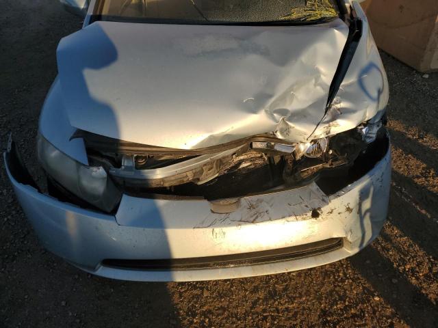 Photo 11 from auction – 2007 HONDA CIVIC HYBR with VIN JHMFA36217S800644