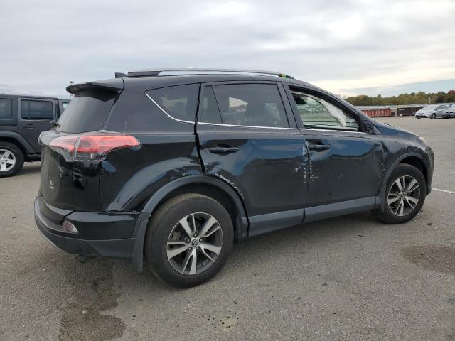 Photo 3 from auction – 2017 TOYOTA RAV4 XLE with VIN 2T3RFREV4HW661925