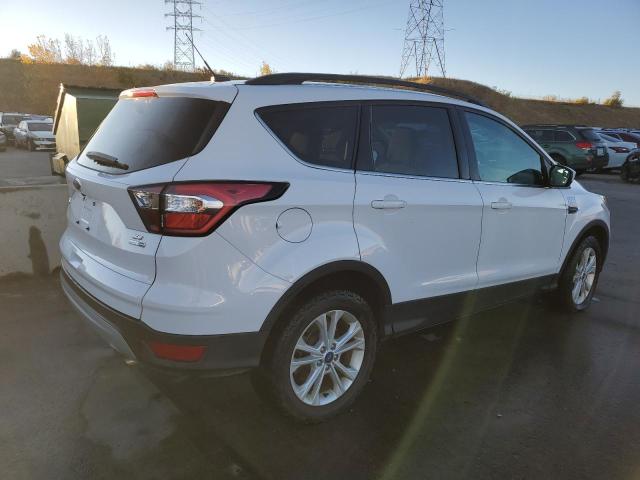 Photo 3 from auction – 2018 FORD ESCAPE SE with VIN 1FMCU9GD1JUC20011