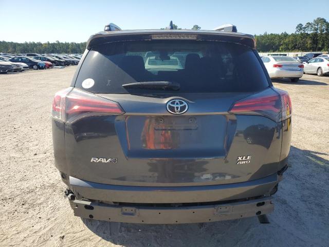 Photo 6 from auction – 2017 TOYOTA RAV4 XLE with VIN JTMRFREV0HD213436
