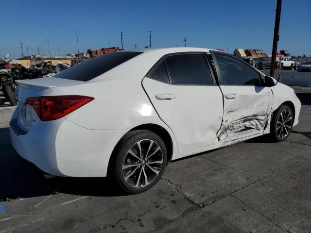 Photo 3 from auction – 2017 TOYOTA COROLLA L with VIN 5YFBURHE8HP699459