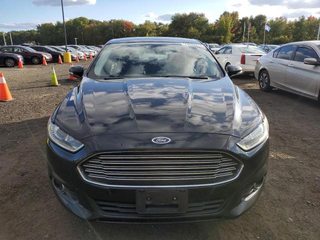 Photo 5 from auction – 2016 FORD FUSION SE with VIN 3FA6P0T93GR336063