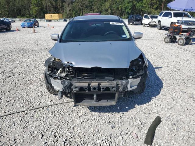 Photo 5 from auction – 2014 FORD FOCUS S with VIN 1FADP3E23EL114921