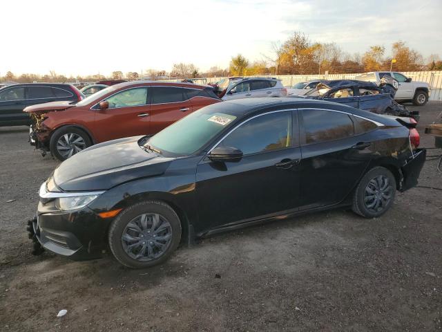 HONDA CIVIC EX 2016 with VIN 2HGFC2F7XGH016733 - Photo from auction