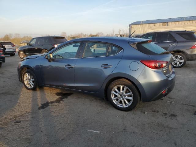 Photo 2 from auction – 2014 MAZDA 3 TOURING with VIN JM1BM1L76E1145525