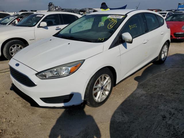 FORD FOCUS SE 2015 with VIN 1FADP3K2XFL223477 - Photo from auction