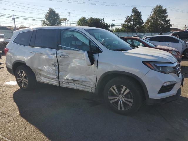Photo 4 from auction – 2016 HONDA PILOT with VIN 5FNYF6H58GB036762
