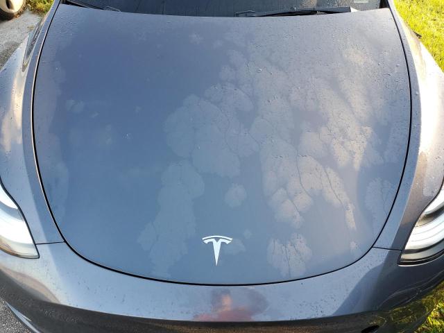 Photo 12 from auction – 2023 TESLA MODEL Y with VIN 7SAYGAEE0PF591891