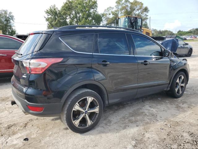 Photo 3 from auction – 2017 FORD ESCAPE SE with VIN 1FMCU9G92HUB65154