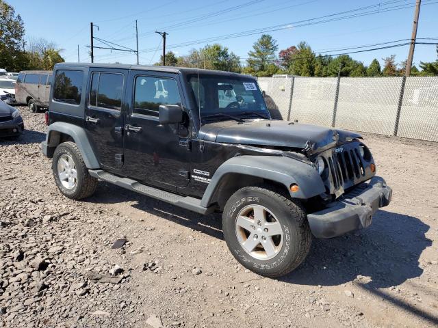 Photo 4 from auction – 2012 JEEP WRANGLER U with VIN 1C4BJWDG5CL235092