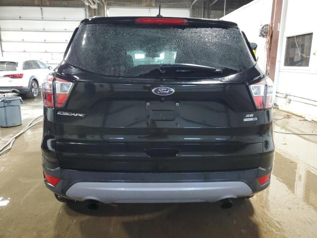 Photo 6 from auction – 2018 FORD ESCAPE SE with VIN 1FMCU9GDXJUC11193