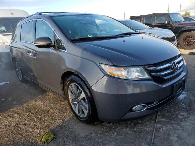 Photo 4 from auction – 2014 HONDA ODYSSEY TO with VIN 5FNRL5H90EB105063