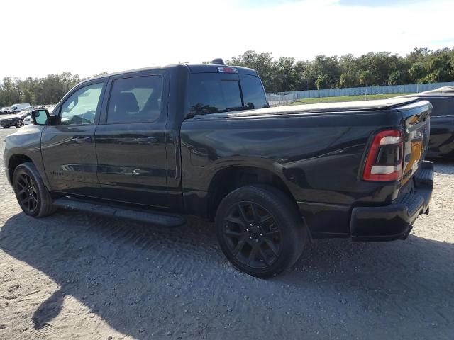 Photo 2 from auction – 2023 RAM 1500 LARAM with VIN 1C6SRFJM9PN556850