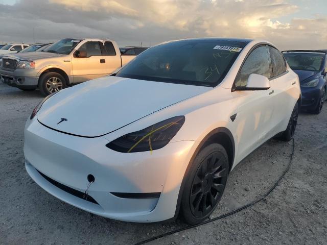 TESLA MODEL Y 2023 with VIN 7SAYGDEE1PF610286 - Photo from auction