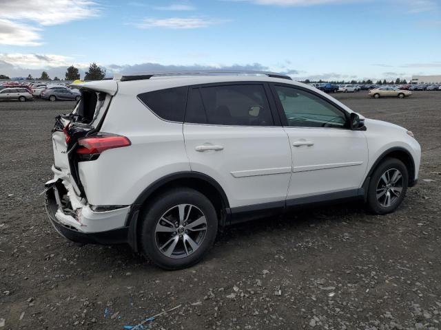 Photo 3 from auction – 2017 TOYOTA RAV4 XLE with VIN JTMRFREV6HJ707916