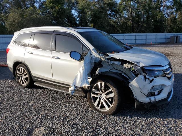 Photo 4 from auction – 2017 HONDA PILOT ELIT with VIN 5FNYF6H07HB056930