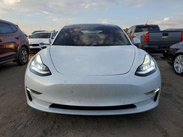 Photo 5 from auction – 2018 TESLA MODEL 3 with VIN 5YJ3E1EB9JF088757