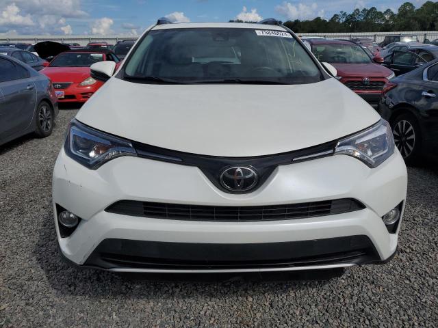 Photo 5 from auction – 2018 TOYOTA RAV4 LIMIT with VIN JTMYFREV4JD109338