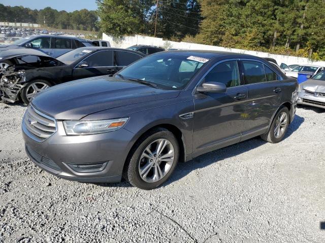 FORD TAURUS SEL 2013 with VIN 1FAHP2E8XDG171320 - Photo from auction