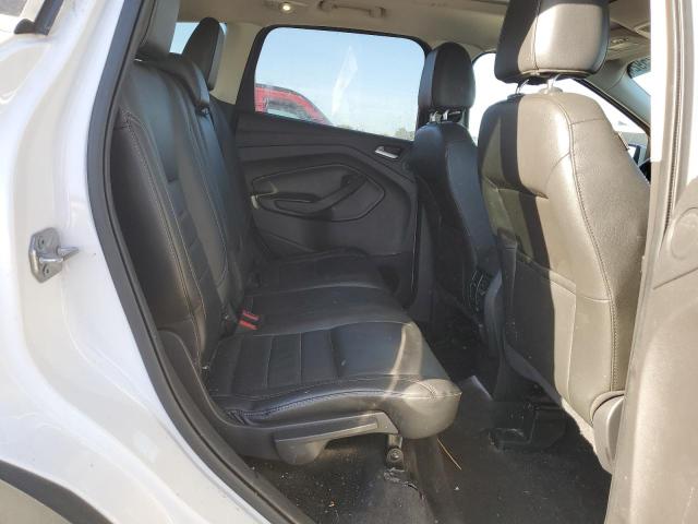 Photo 11 from auction – 2015 FORD ESCAPE TIT with VIN 1FMCU9J98FUA02529